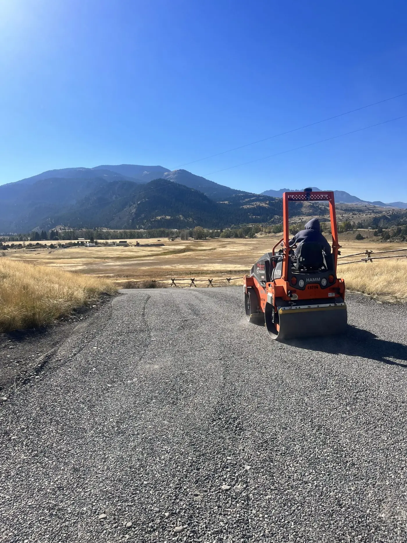 Gravel road construction and grading on a Montana property
